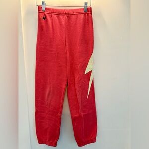 Aviator Nation Bolt Sweatpants in Red with neon yellow bolt